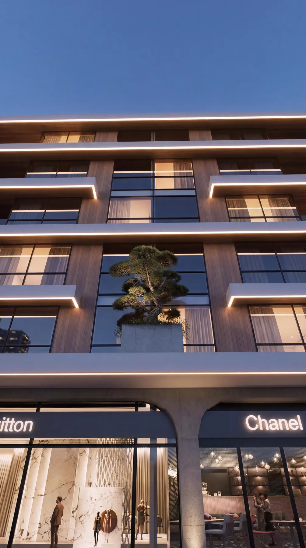 Gama projesi zemin kat vitrinleri ve üst katlardaki ağaçlı balkon nişleri, akşam