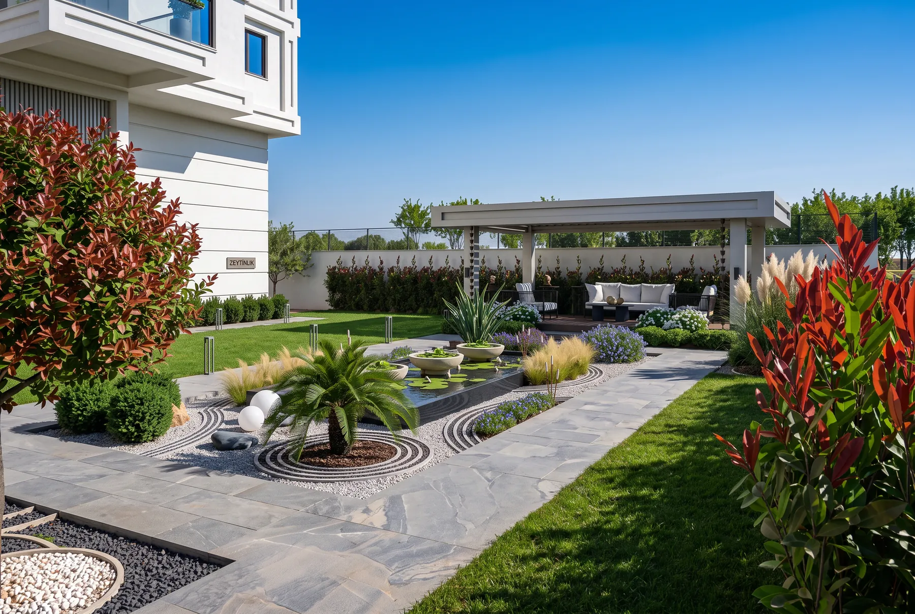 Karat Alyans arka bahçe geniş görünüm, taş yürüyüş yolu, pergola ve renkli peyzaj